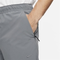 Pantaloni Nike Unlimited Dri-FIT Zippered Cuff Versatile pentru Barbati gri negru