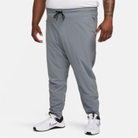 Pantaloni Nike Unlimited Dri-FIT Zippered Cuff Versatile pentru Barbati gri negru