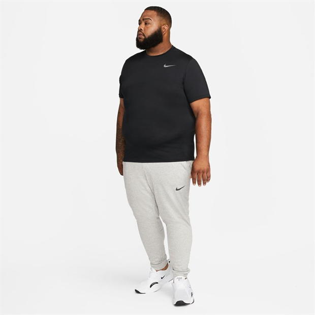 Pantaloni de trening Nike Dri-FIT conici pentru Barbati inchis gri deschis