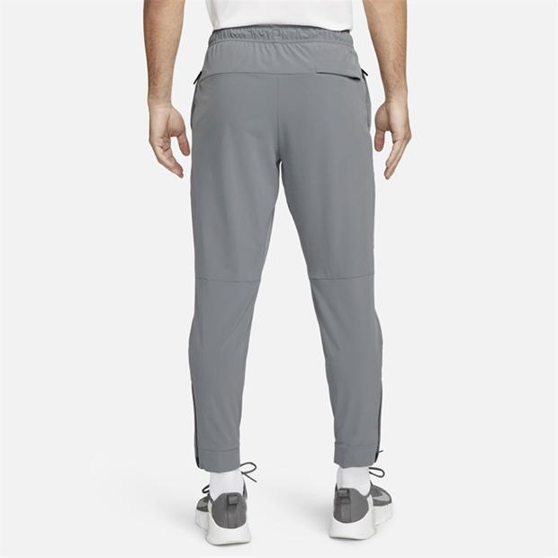 Pantaloni Nike Unlimited Dri-FIT Zippered Cuff Versatile pentru Barbati gri negru