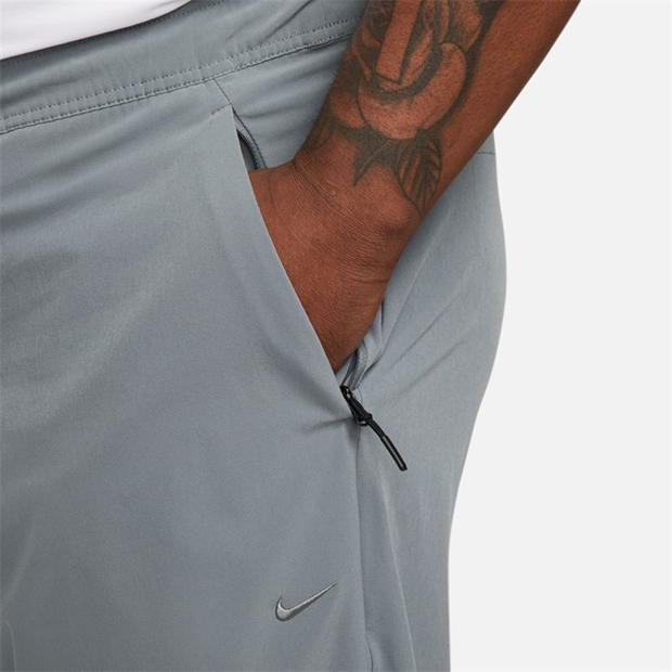 Pantaloni Nike Unlimited Dri-FIT Zippered Cuff Versatile pentru Barbati gri negru