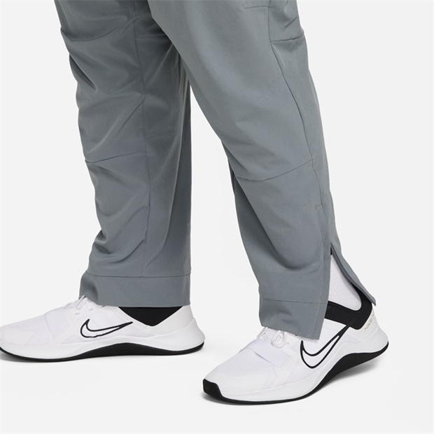 Pantaloni Nike Unlimited Dri-FIT Zippered Cuff Versatile pentru Barbati gri negru